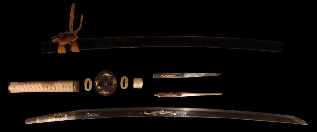 Samurai sword koshirae containing tsuka, tsuba, mekugi, saya, seppa, kogai, kozuka and blade.