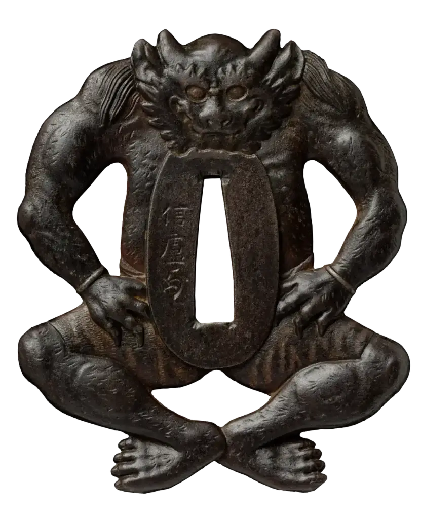 Iron tsuba shaped as an oni demon figure with a signature, front view