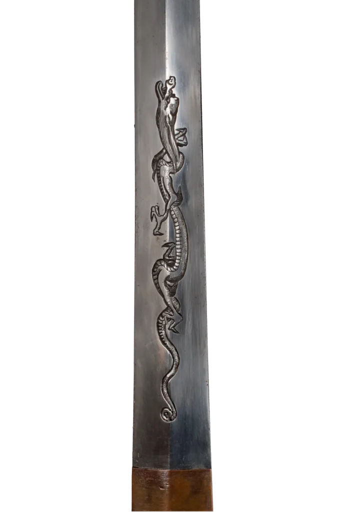 Katana blade with an engraved dragon (horimono) in polished steel