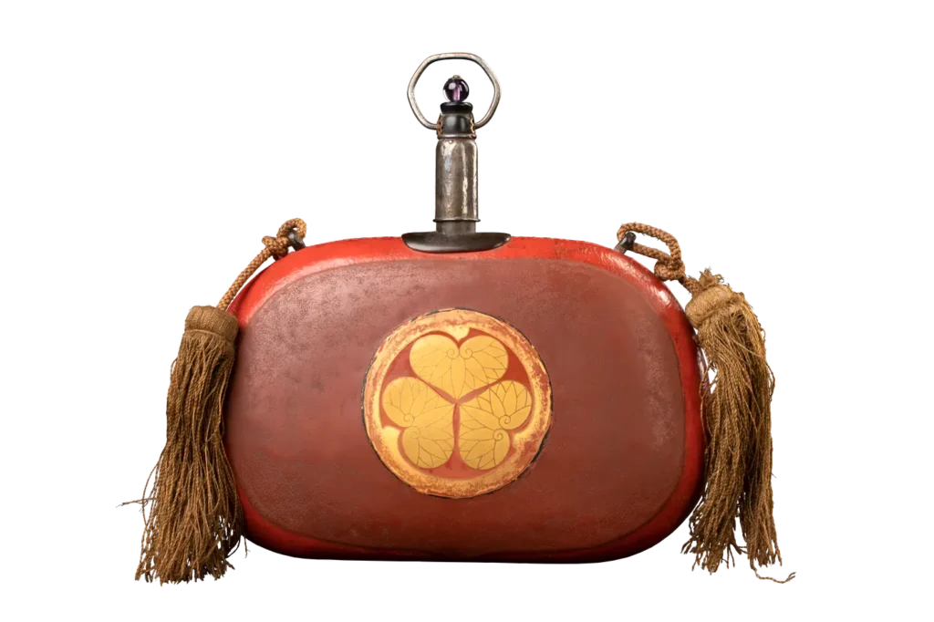 Field flask with Tokugawa crest, red lacquer with gold and tassels