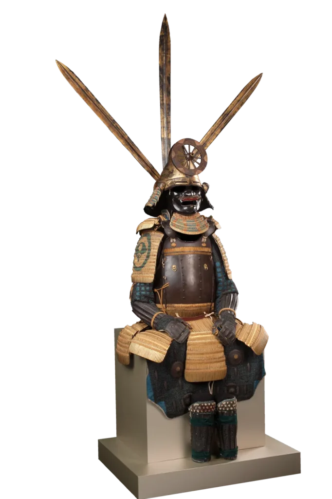 Complete tōsei-gusoku armour with a wheel-shaped maedate crest and swords, seated full view