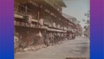 Historisches Foto einer Straße mit Fahrrädern und Passanten, das das alltägliche Leben vergangener Zeiten zeigt.