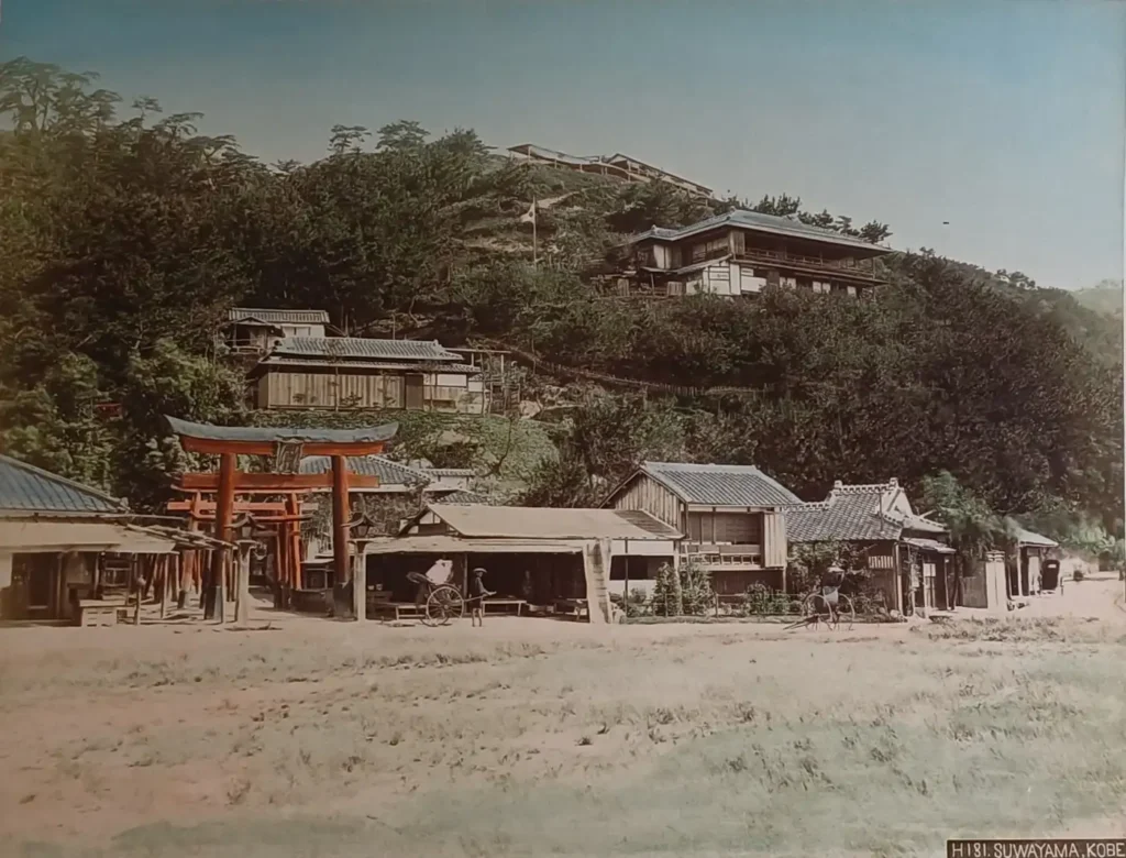 Hand-coloured photograph of the Suwayama torii in Kobe, 1888
