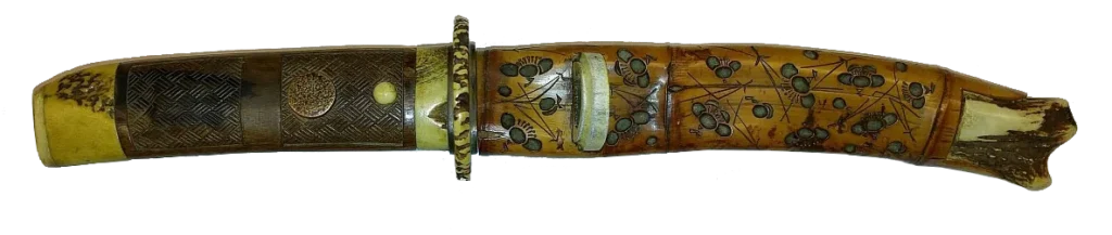 Tantō koshirae of wood and bone with engraved blossom decoration